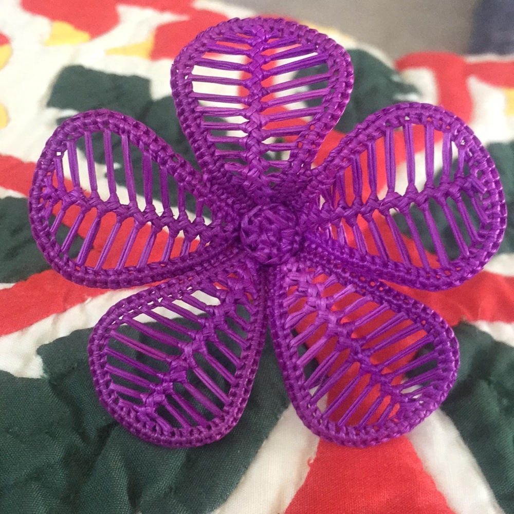 Purple woven flower